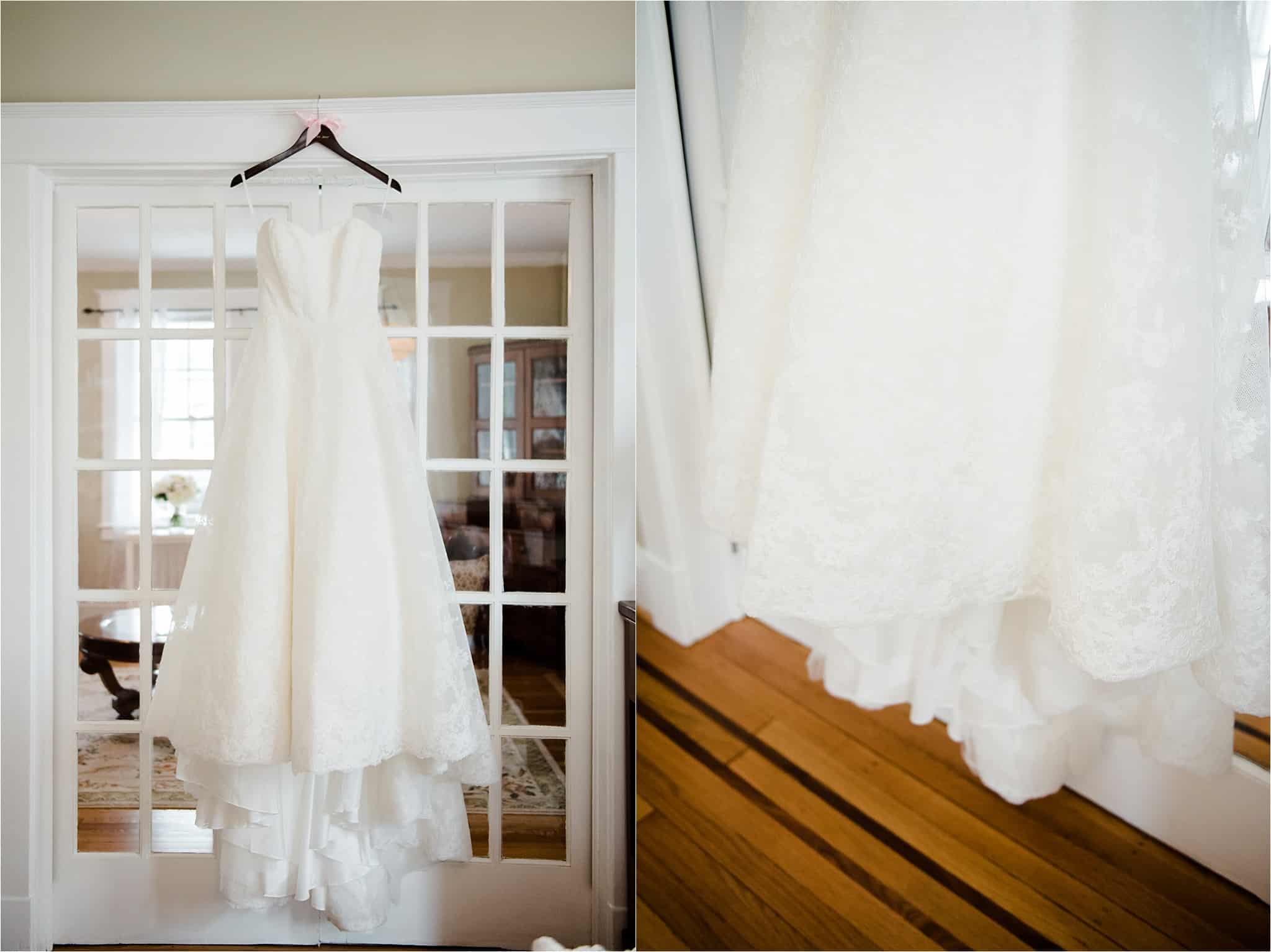 White wedding gown hanging on a wooden hanger for a Legg Mason Tower Baltimore Maryland Spring Wedding
